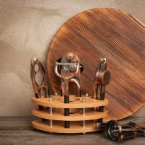 stand-with-kitchen-utensils-table-against-wall_392895-601057